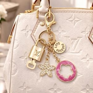 Authentic Louis Vuitton Lock & Key with Unbranded Flower Charm, Keychain